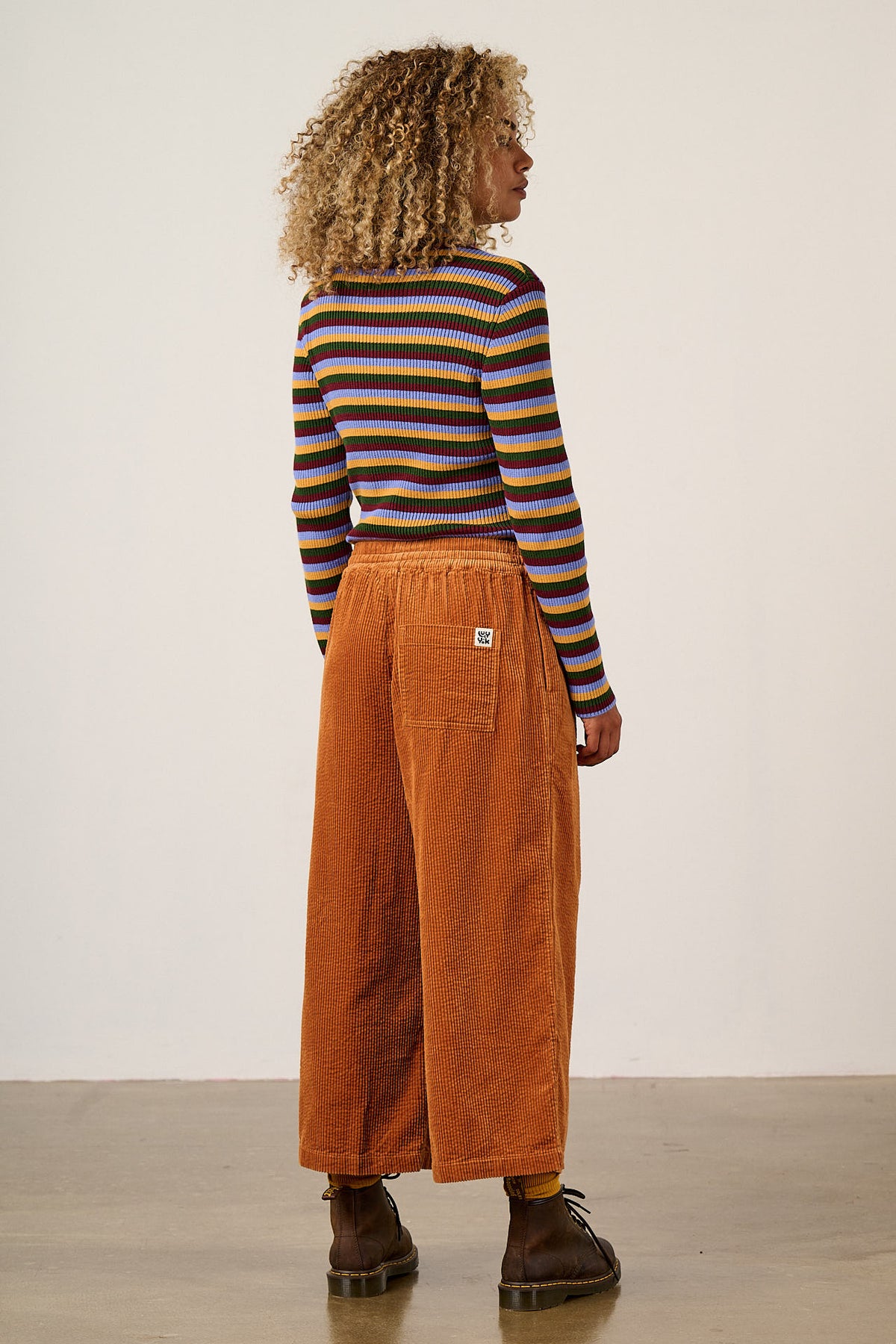 Chuck - Organic Corduroy Wide Leg Trousers in Rust