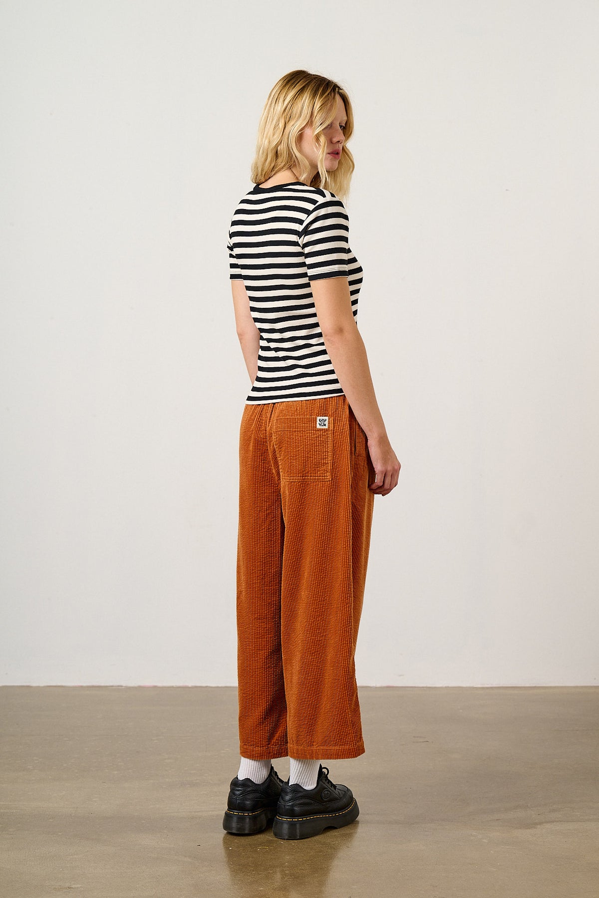 Chuck - Organic Corduroy Wide Leg Trousers in Rust