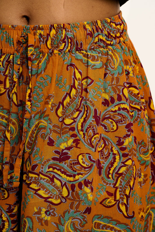 Aster - Cotton & Linen Trousers in Orange Sunset Paisley Print