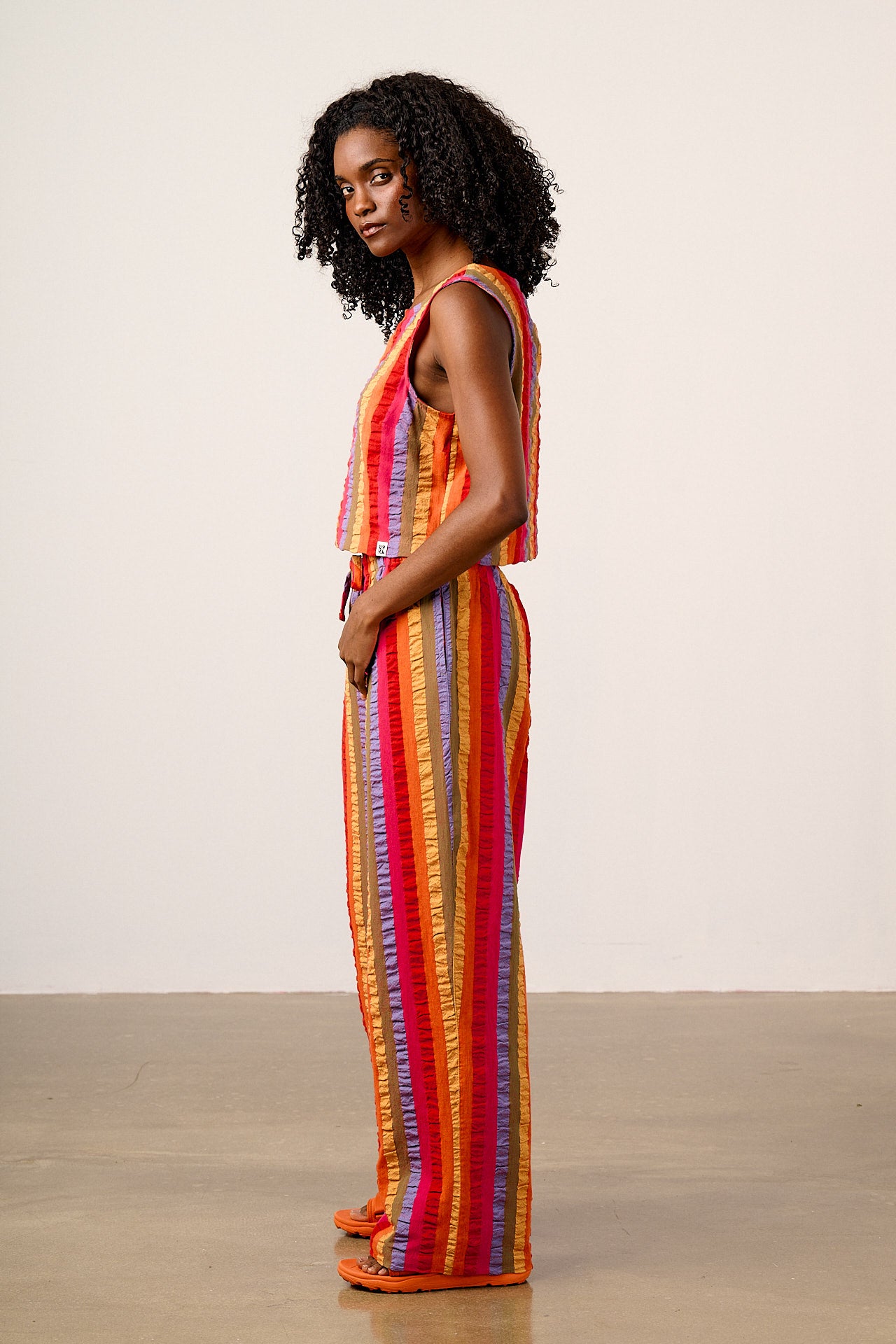 Norris - Wide Leg Cotton Trousers in Wide Rainbow Stripe