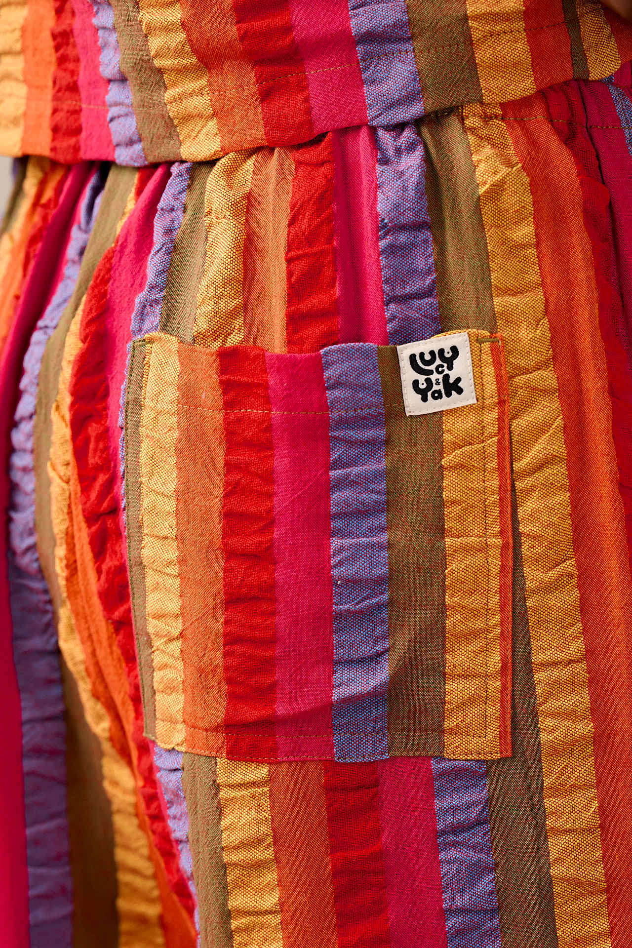 Norris - Wide Leg Cotton Trousers in Wide Rainbow Stripe