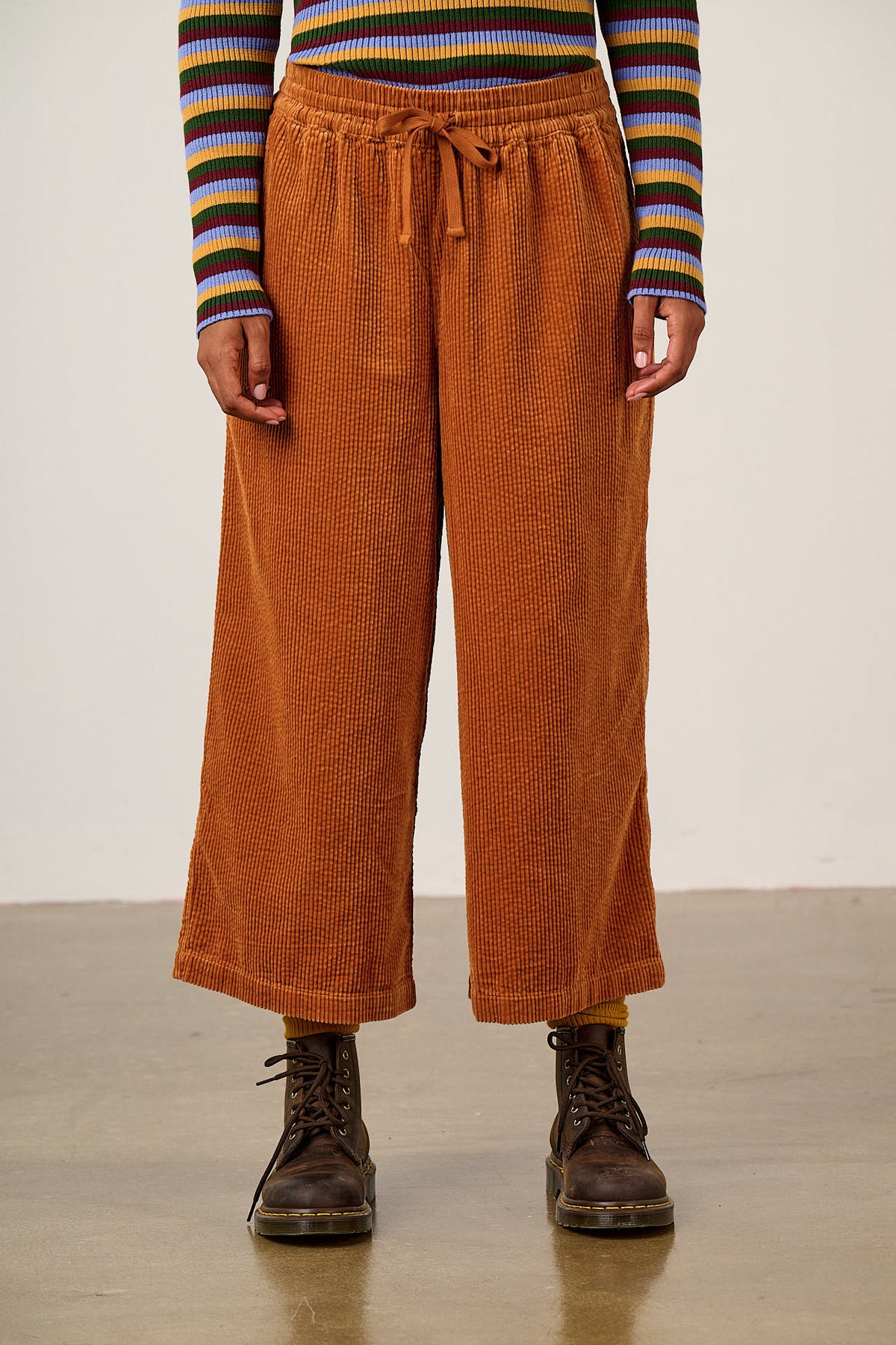 Chuck - Organic Corduroy Wide Leg Trousers in Rust