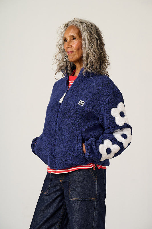 Margot Borg Fleece - Recycled Polyester in Navy and Ecru with Flower