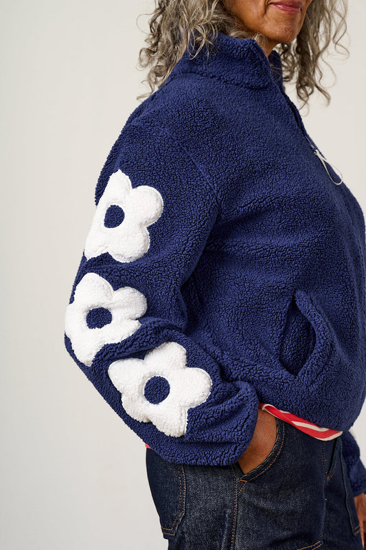 Margot Borg Fleece - Recycled Polyester in Navy and Ecru with Flower