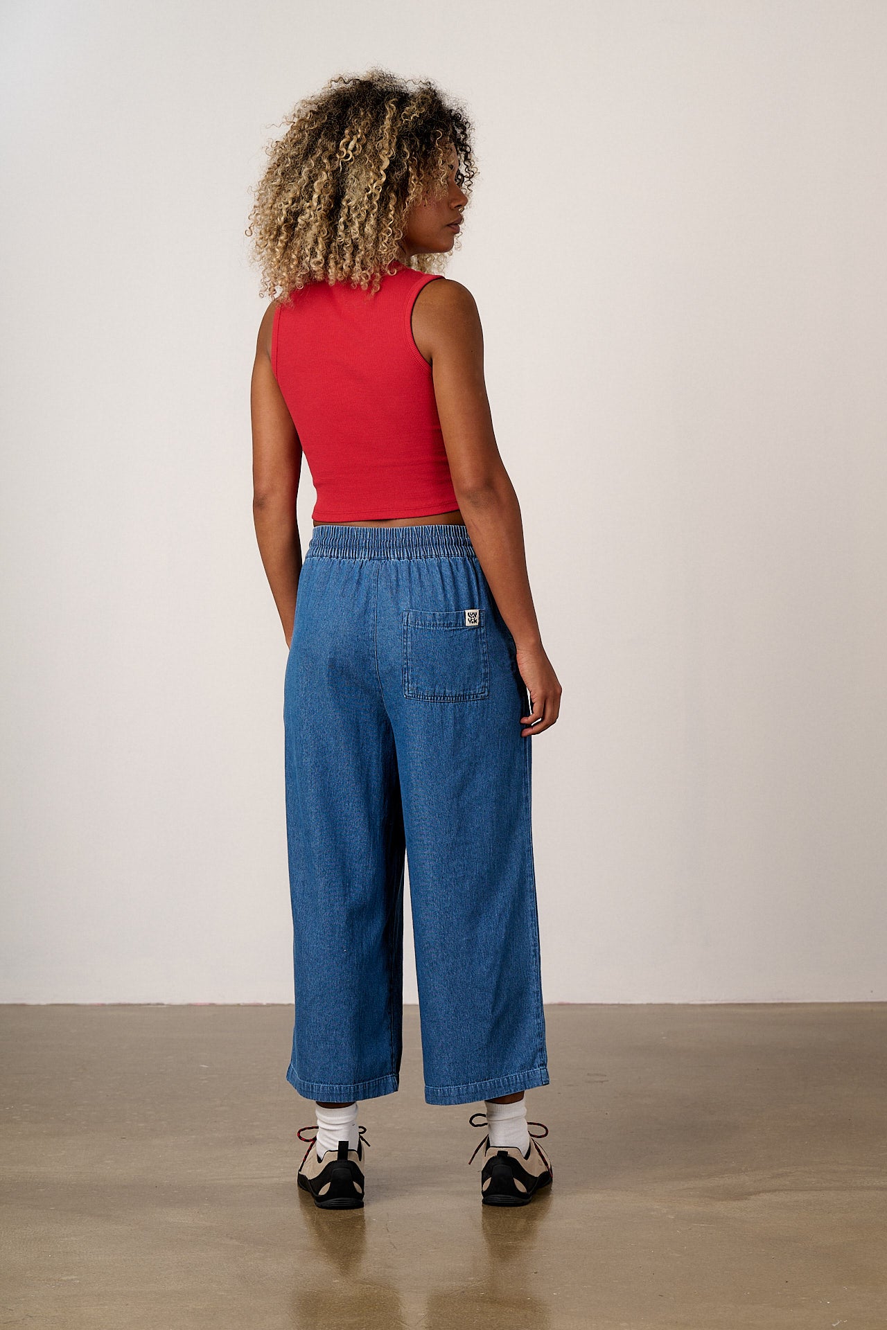 Chuck - Wide Leg Denim Trousers in Midwash Blue