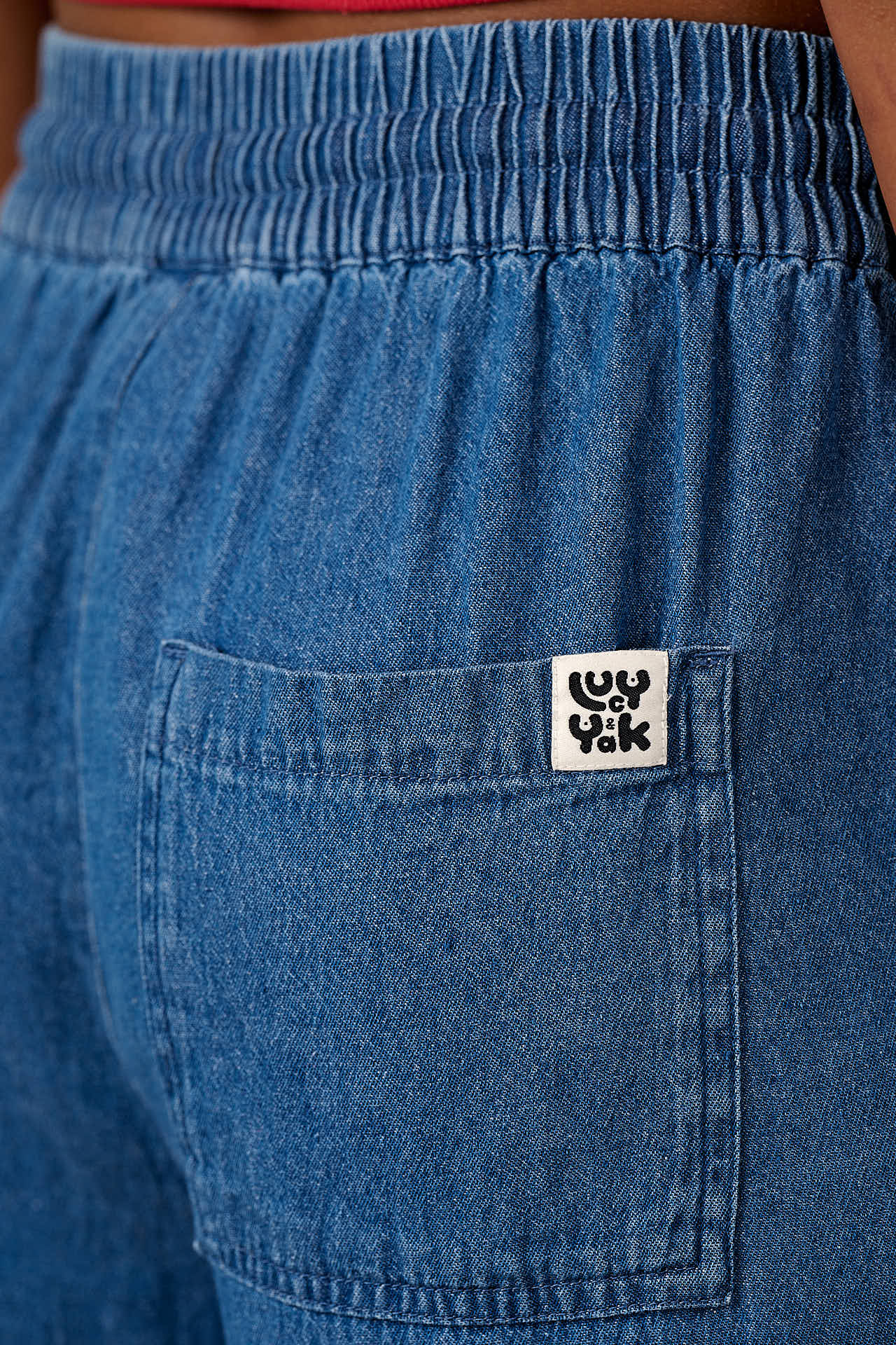 Chuck - Wide Leg Denim Trousers in Midwash Blue