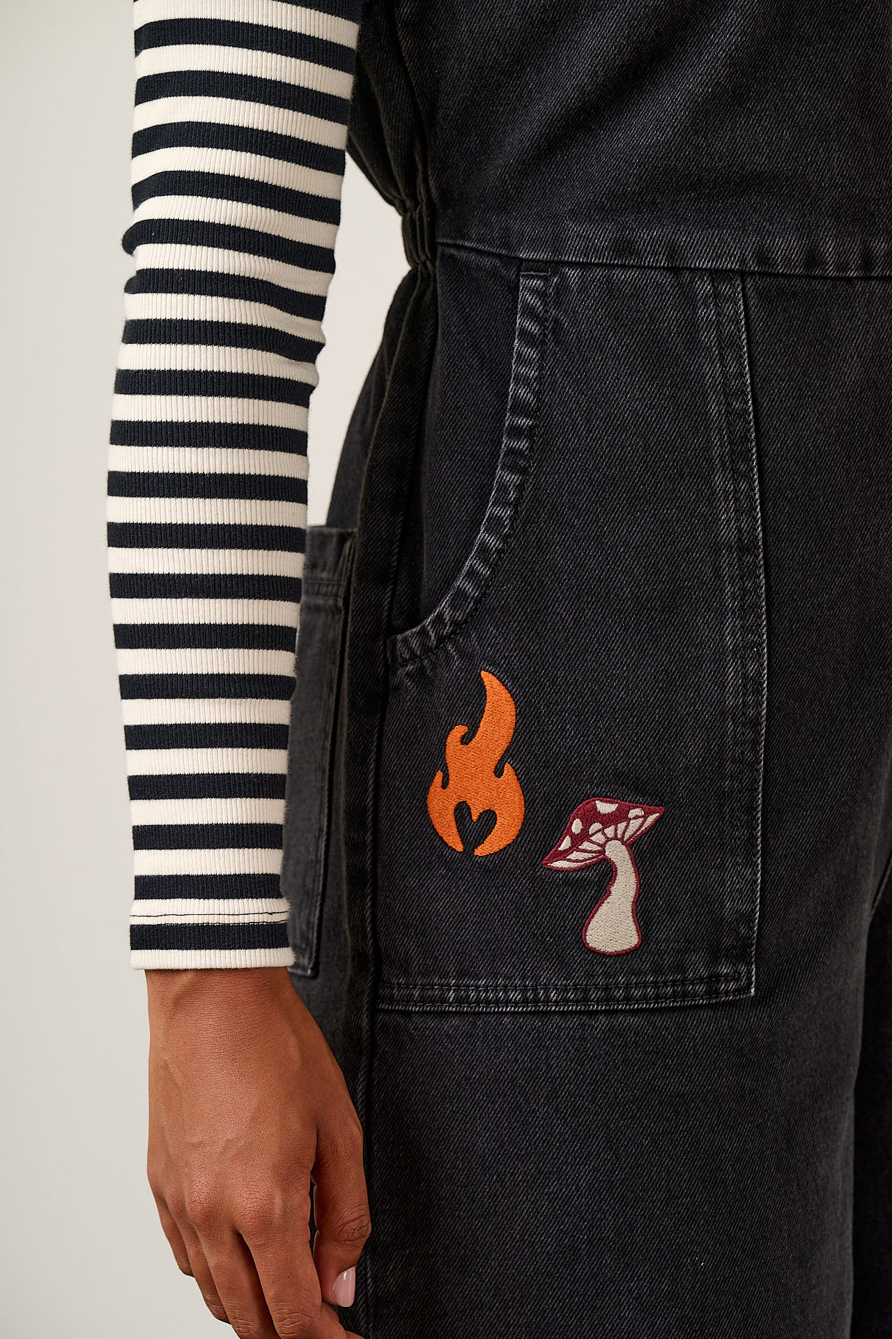 Ragan - Denim Jumpsuit in Washed Black with Punk Energy Patches