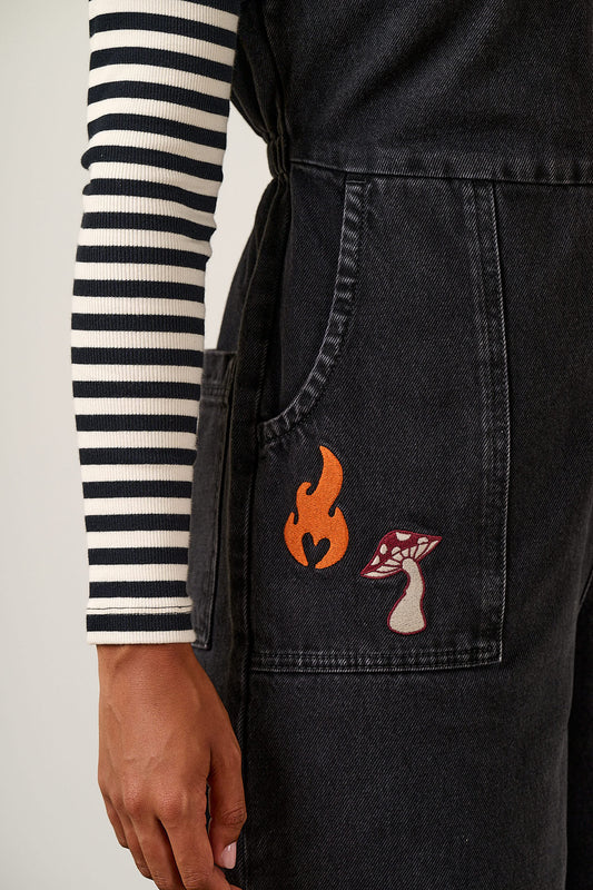 Ragan - Denim Jumpsuit in Washed Black with Punk Energy Patches