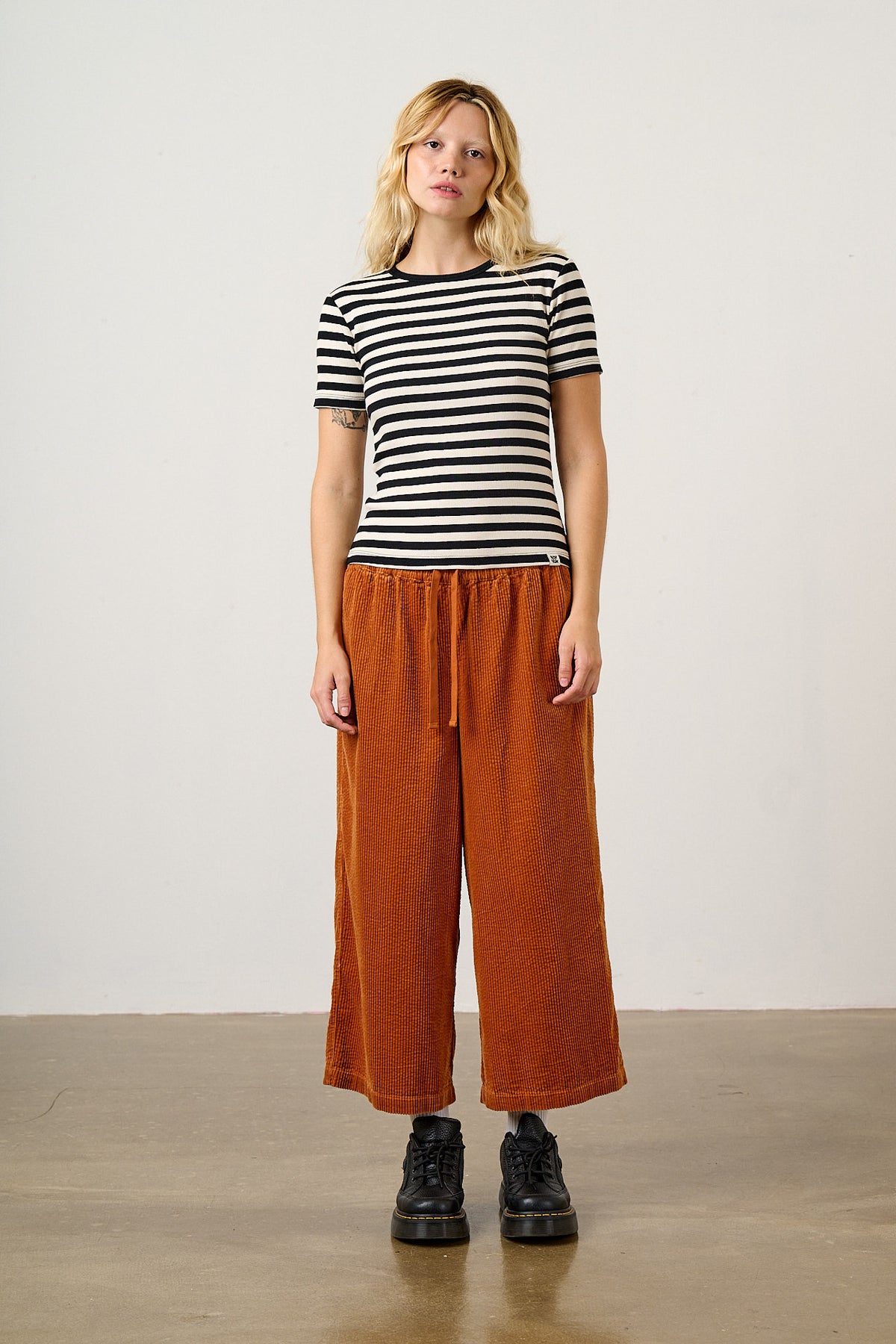 Chuck - Organic Corduroy Wide Leg Trousers in Rust