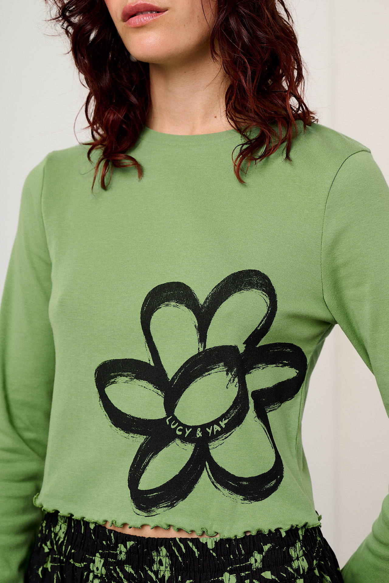 Hansel - Long Sleeve Cotton Crop Top in Green Scribble Floral