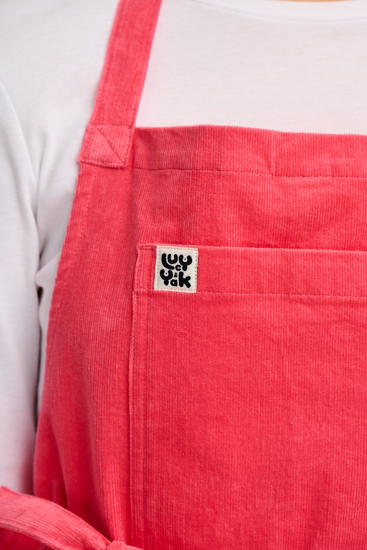 Ada - Corduroy Apron in Bubblegum Pink