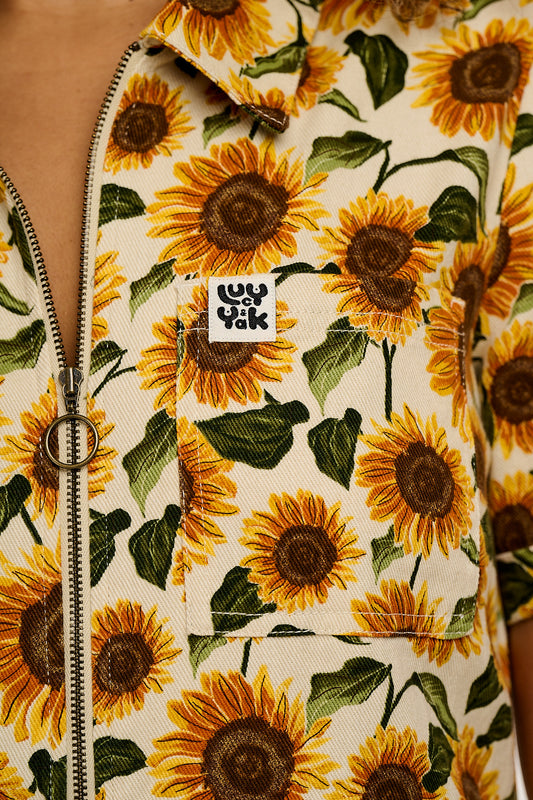 Rex - Short Sleeve Twill Jumpsuit in Cream Sunflower Print