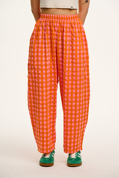 Freddie Barrel Leg Cotton Seersucker Trousers in Pink Orange