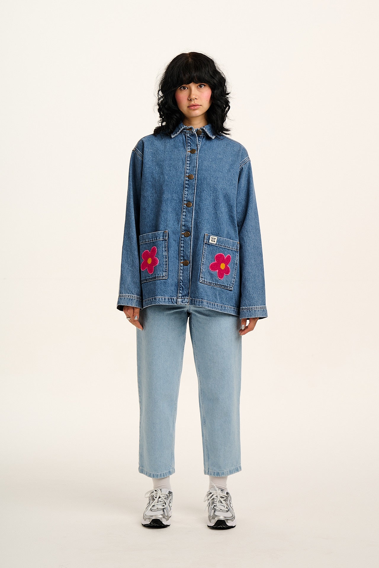 Olly - Denim Jacket in Mid Wash Blue with Pink Flower Motif
