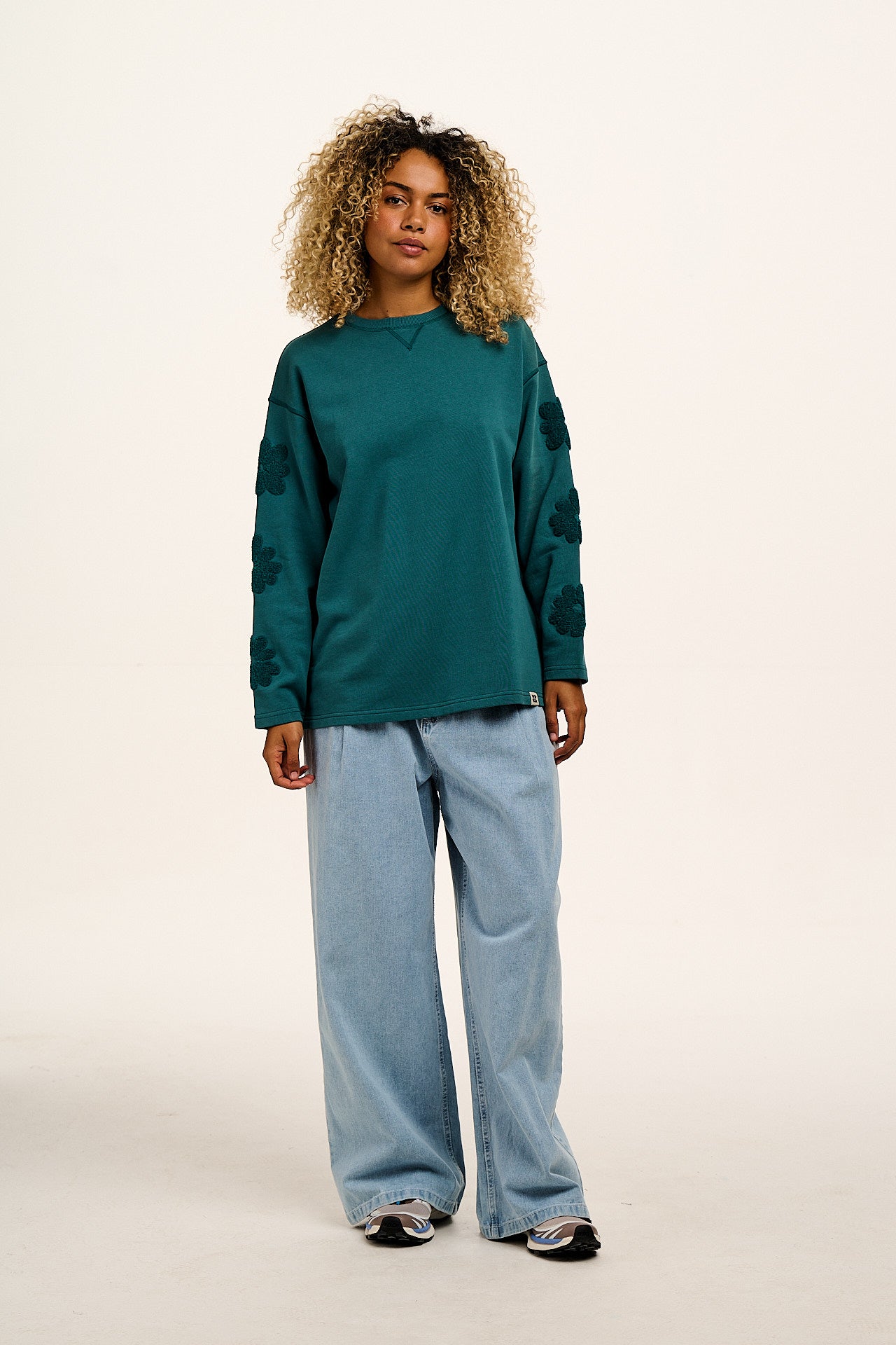 Kai - Midweight Cotton Crew Neck Sweatshirt in Teal Tucker with Flower Motif