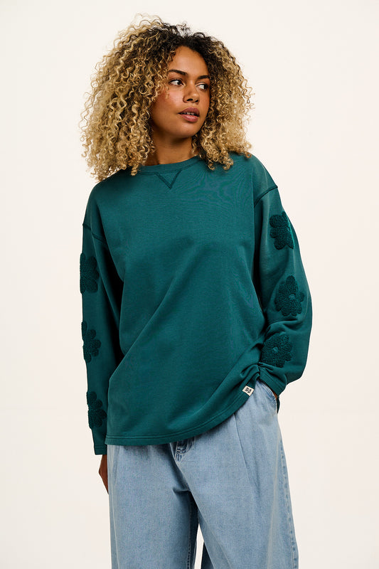 Kai - Midweight Cotton Crew Neck Sweatshirt in Teal Tucker with Flower Motif