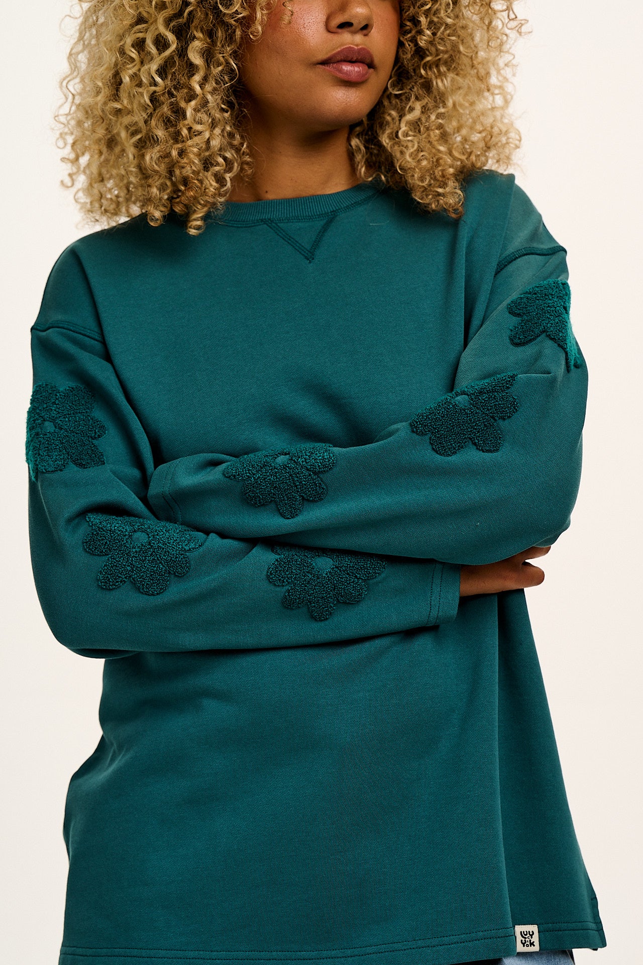 Kai - Midweight Cotton Crew Neck Sweatshirt in Teal Tucker with Flower Motif