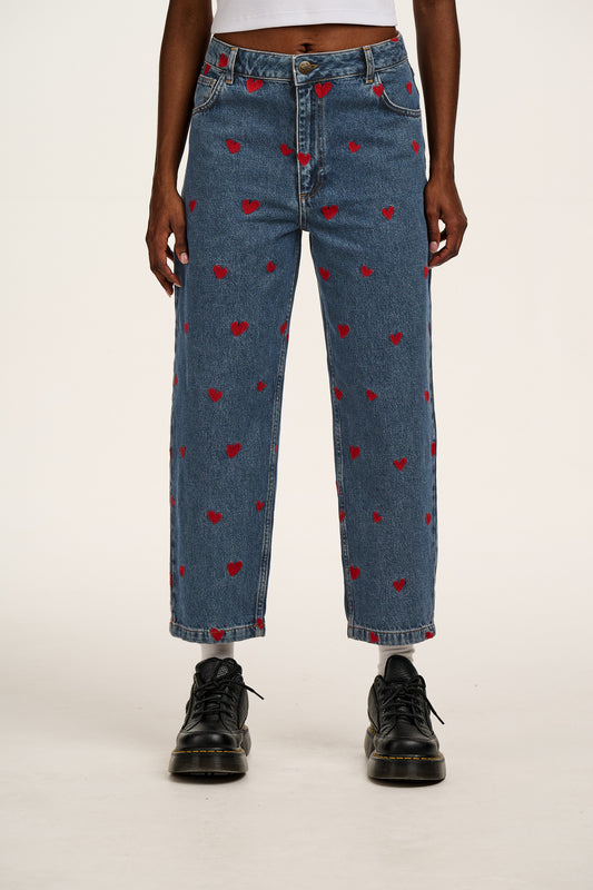 Drew - Cropped Straight Leg Denim Jeans in Mid Wash Blue with Cupid Hearts Embroidery