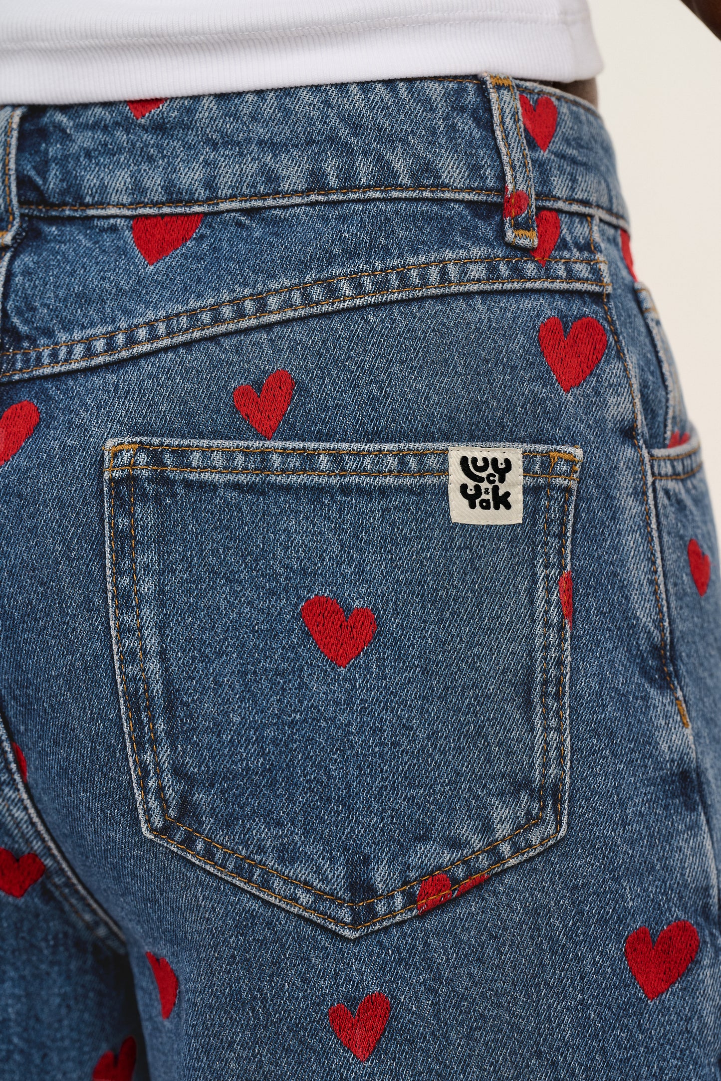 Drew - Cropped Straight Leg Denim Jeans in Mid Wash Blue with Cupid Hearts Embroidery