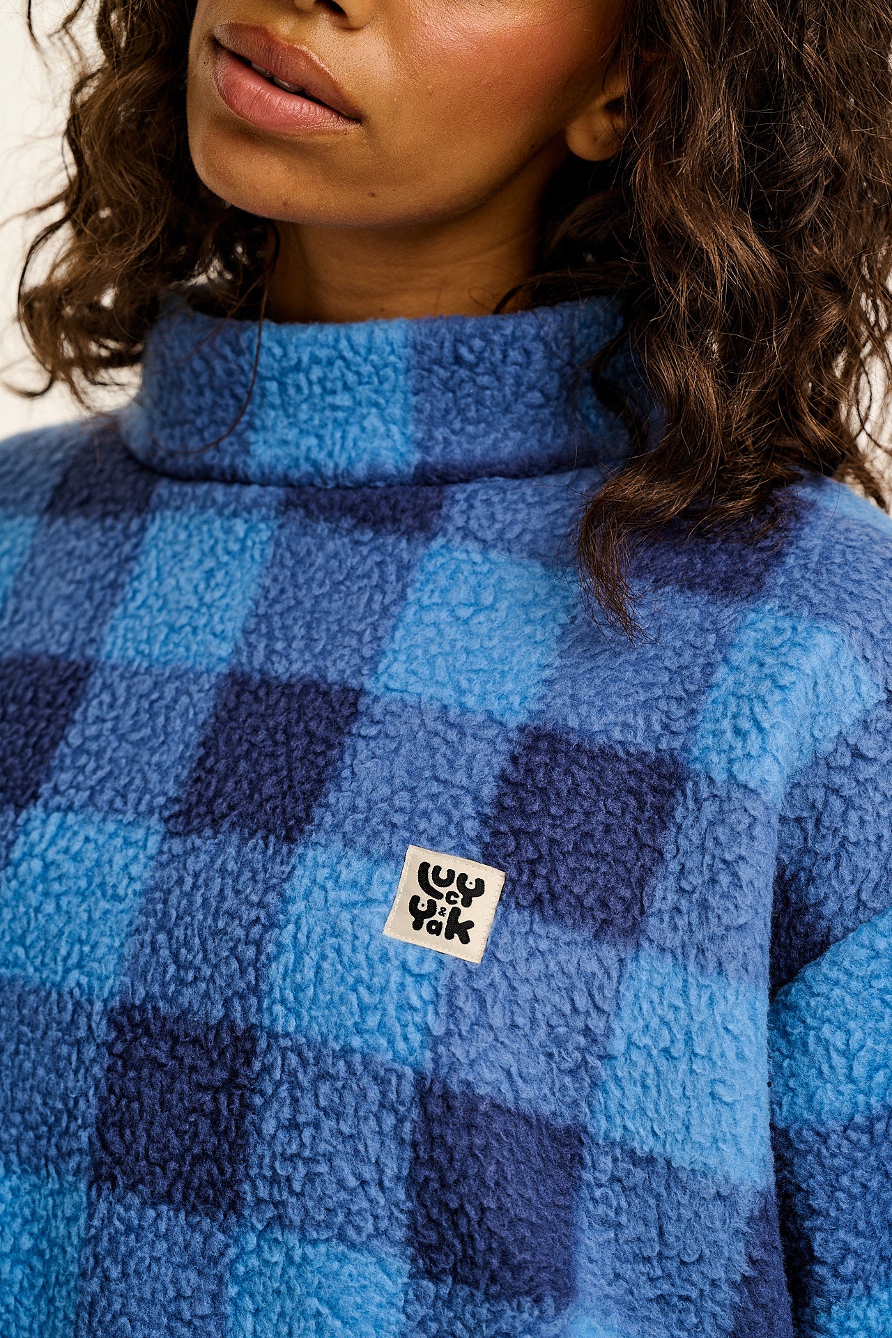Manaia - Funnel Neck Polar Fleece in Blue Check