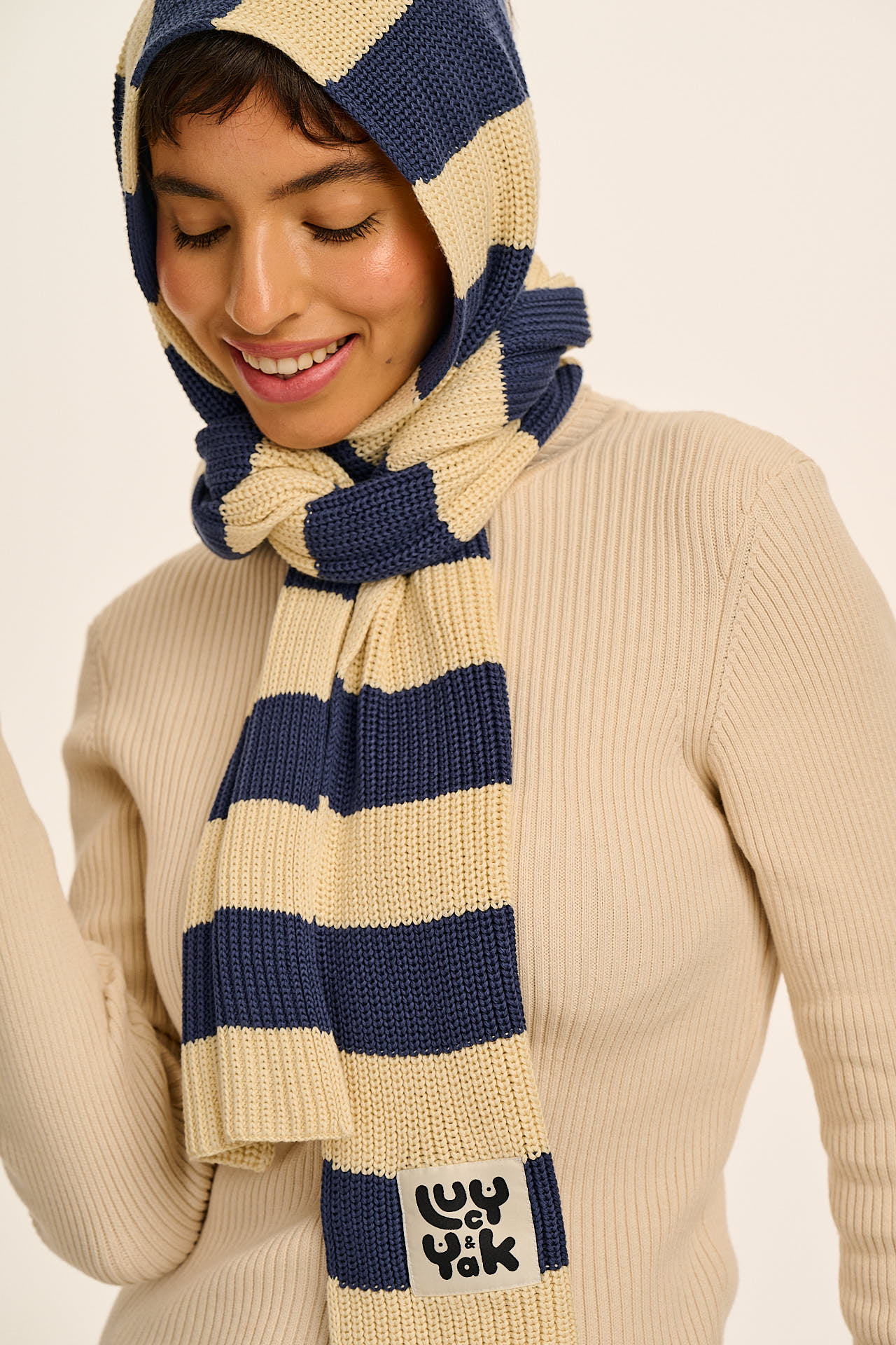 Aroha - Knitted Scarf in Blue and Ecru Stripe