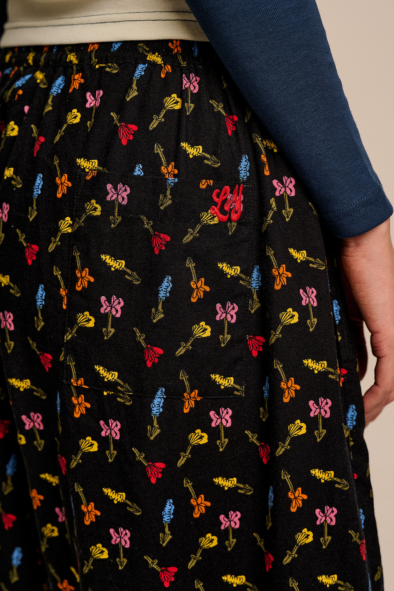 Renata - Cuffed Cotton Balloon Leg Trousers in Mini Tulips on Black