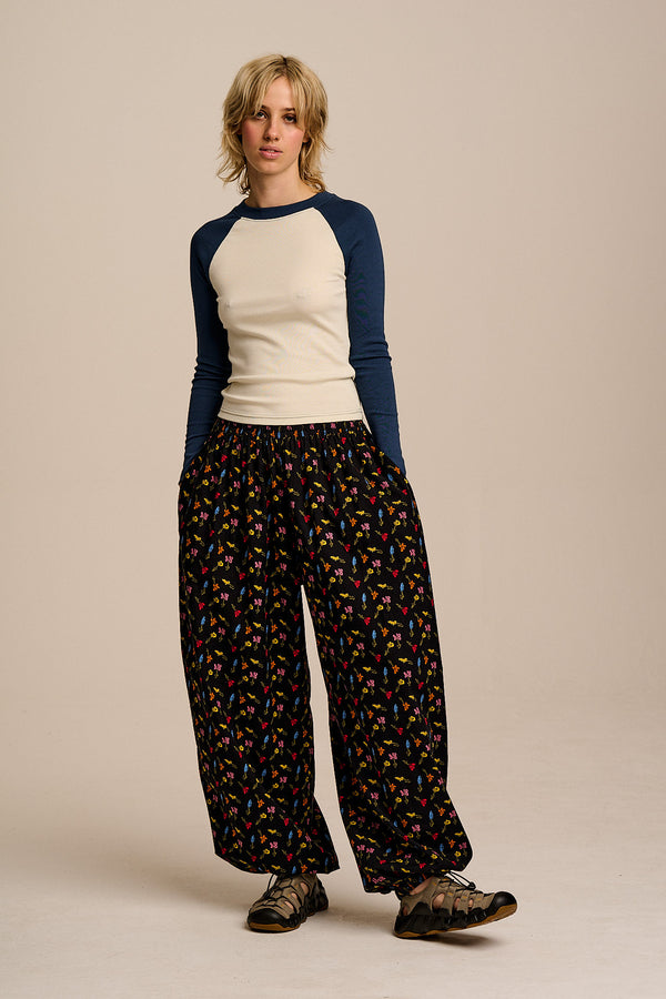 Renata - Cuffed Cotton Balloon Leg Trousers in Mini Tulips on Black
